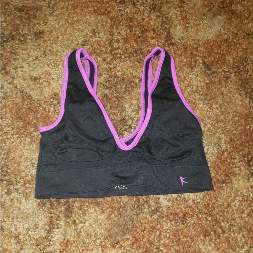 black and purple low cut sports bra